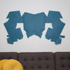 blue laser cut felt wall hanging by design and conquer above couch